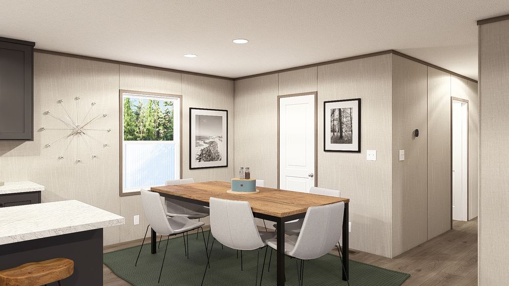 The LEGEND 28X56 3 BR Dining Room. This Manufactured Mobile Home features 3 bedrooms and 2 baths.