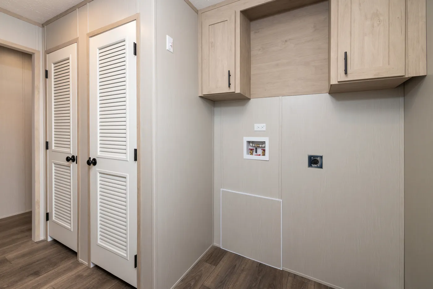 The VISION Utility Room. This Manufactured Mobile Home features 4 bedrooms and 2 baths.