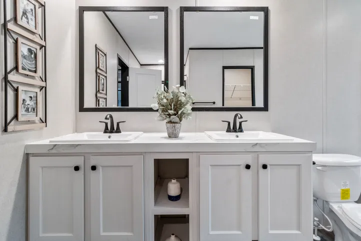 The THE RENEGADE Primary Bathroom. This Manufactured Mobile Home features 3 bedrooms and 2 baths.