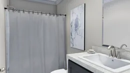 The CAROLINIAN M5000 Guest Bathroom. This Manufactured Mobile Home features 3 bedrooms and 2 baths.