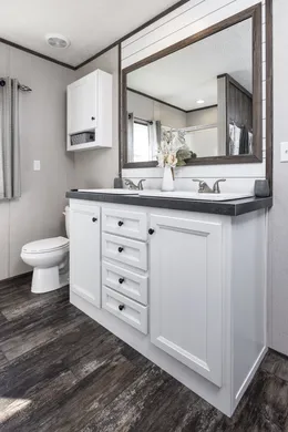THE SURE THING Primary Bathroom. This Home features 3 bedrooms and 2 baths.