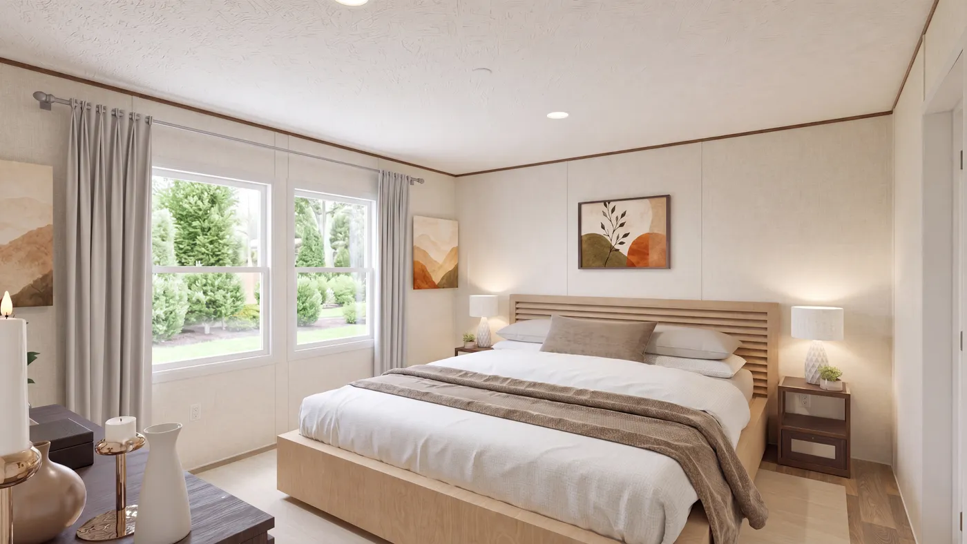 The OAK Primary Bedroom. This Manufactured Mobile Home features 4 bedrooms and 2 baths.