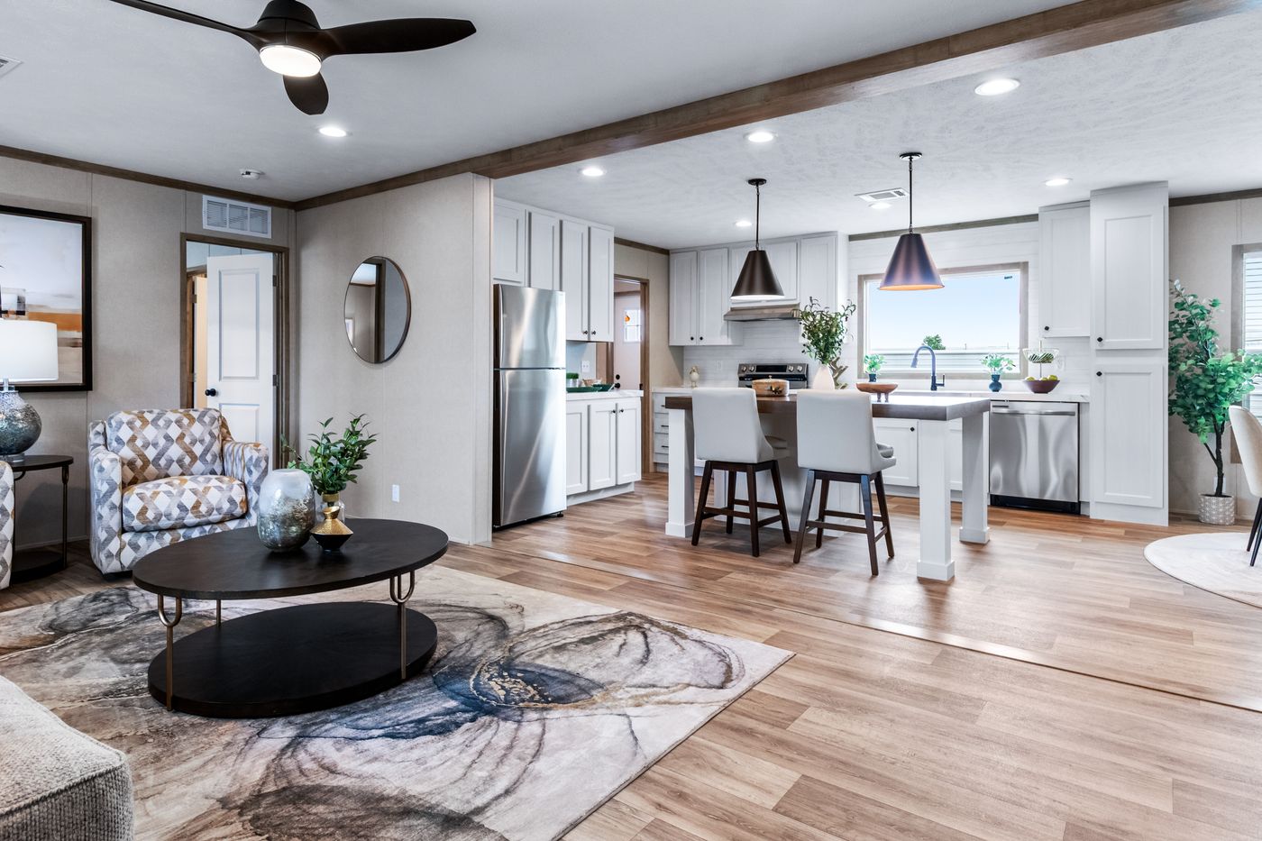 The THE CHOICE Living Room. This Manufactured Mobile Home features 4 bedrooms and 2 baths.
