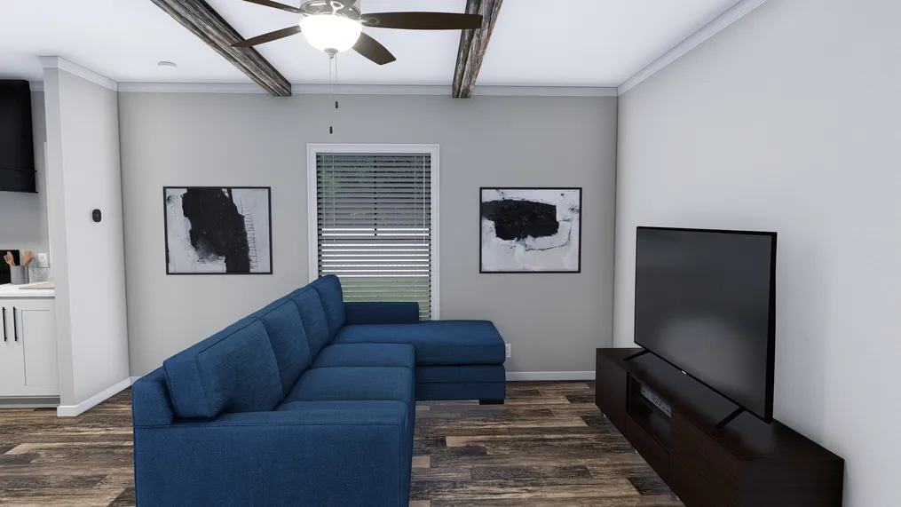 The THE HOLLYWOOD Living Room. This Manufactured Mobile Home features 3 bedrooms and 2 baths.