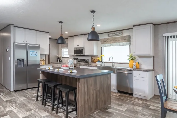 The LOCKLEAR Exterior. This Manufactured Mobile Home features 4 bedrooms and 2 baths.