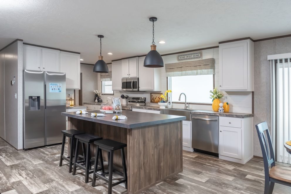 The LOCKLEAR Exterior. This Manufactured Mobile Home features 4 bedrooms and 2 baths.