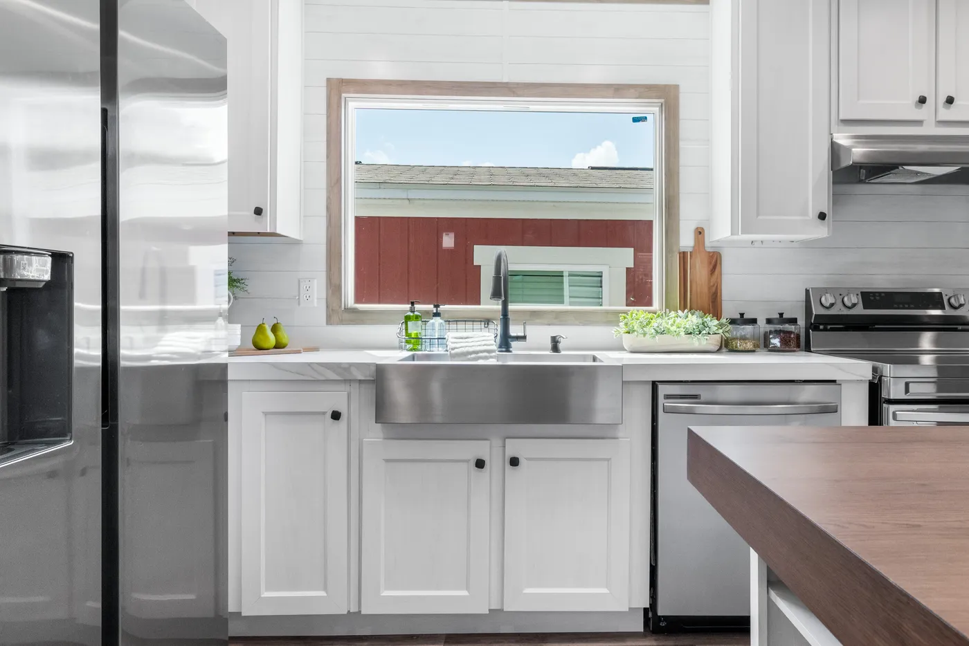 The THE REAL DEAL Kitchen. This Manufactured Mobile Home features 3 bedrooms and 2 baths.