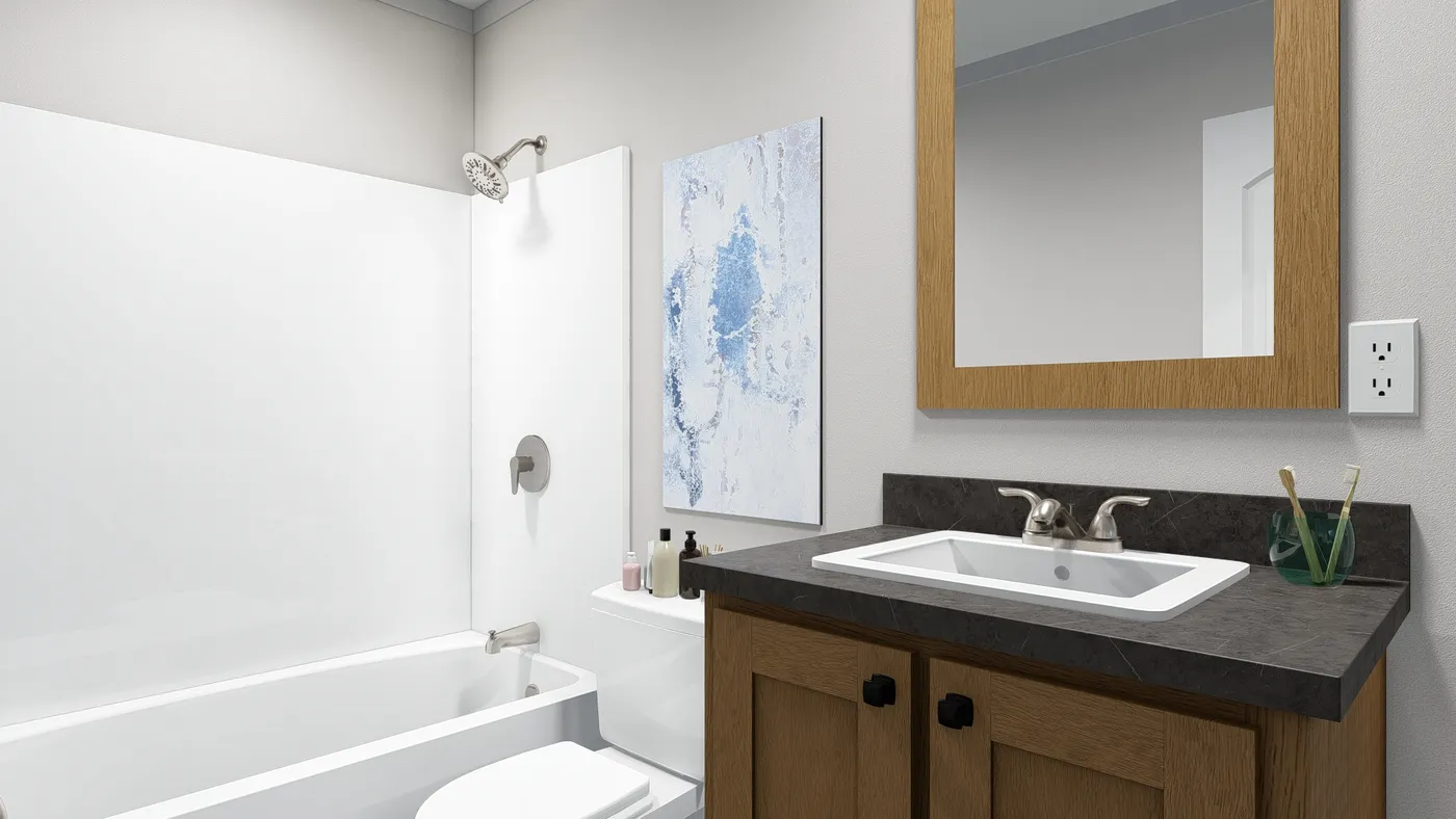 The SWEET DREAMS Guest Bathroom. This Manufactured Mobile Home features 3 bedrooms and 2 baths.