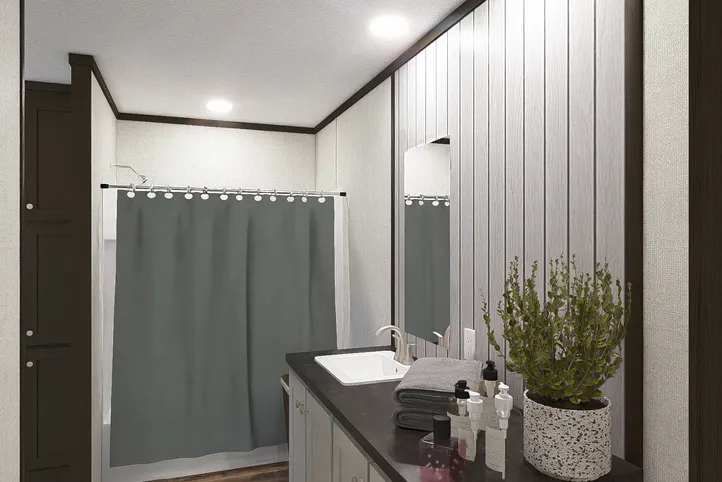 The OCCASION Primary Bathroom. This Manufactured Mobile Home features 4 bedrooms and 2 baths.