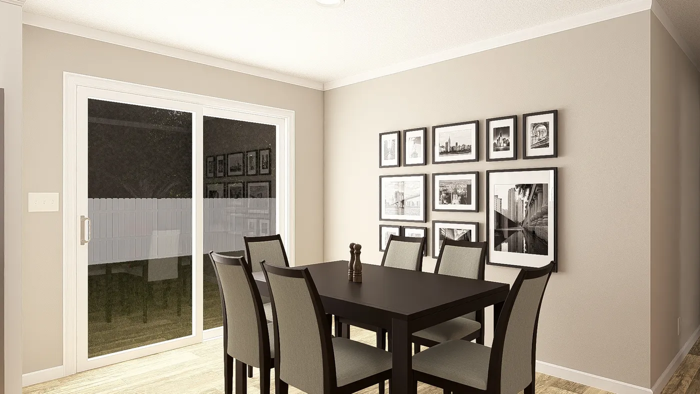 The THE BIG EASY Dining Area. This Manufactured Mobile Home features 4 bedrooms and 3 baths.