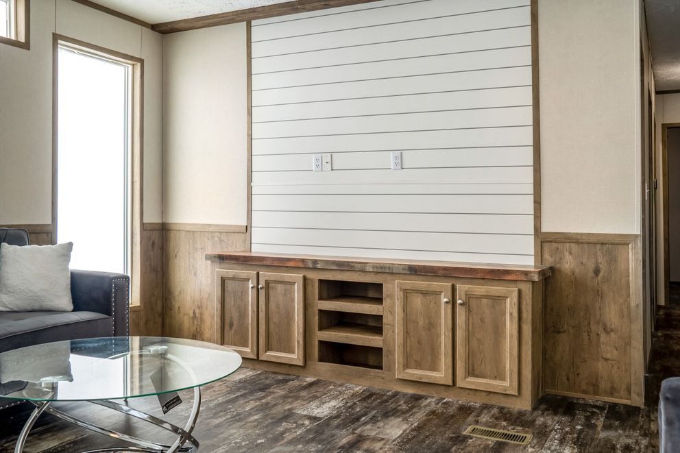 The ANNIVERSARY ENTERTAINER Exterior. This Manufactured Mobile Home features 3 bedrooms and 2 baths.
