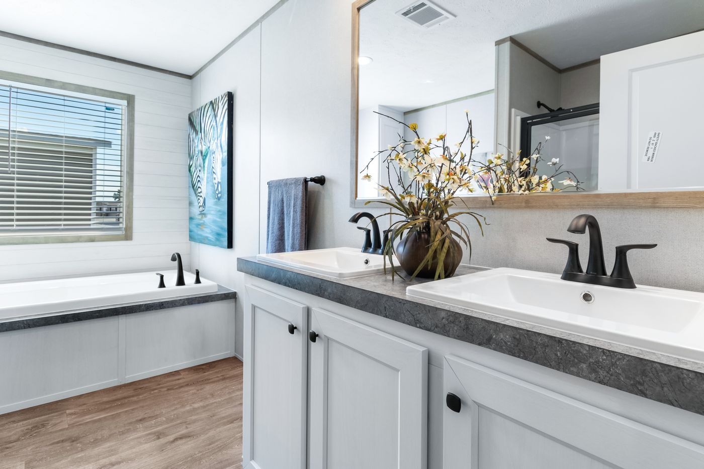 The PT 78 Primary Bathroom. This Manufactured Mobile Home features 3 bedrooms and 2 baths.