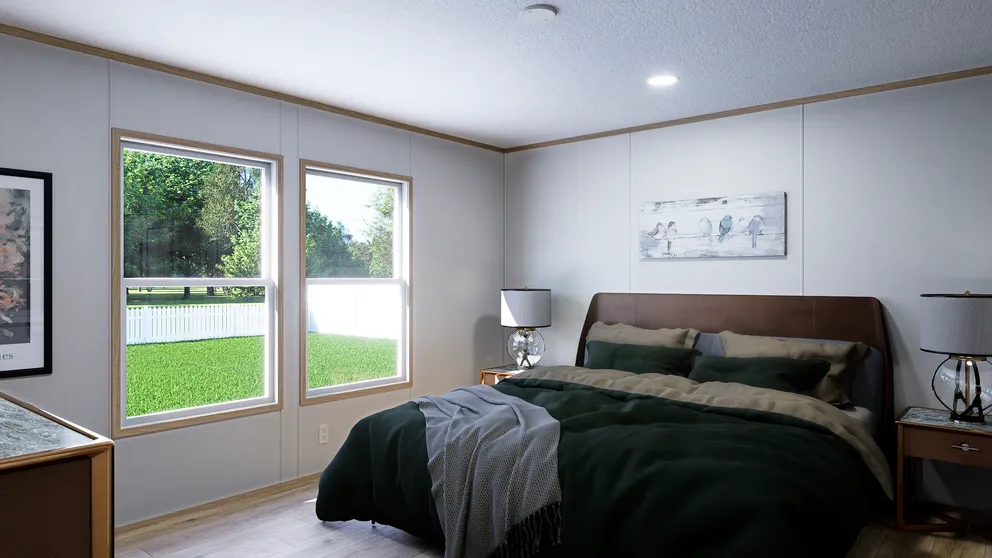 The ECLIPSE Primary Bedroom. This Manufactured Mobile Home features 4 bedrooms and 2 baths.