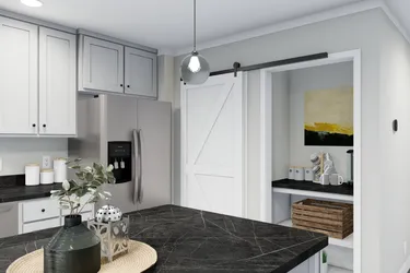 The THE BREEZE Kitchen. This Manufactured Mobile Home features 3 bedrooms and 2 baths.