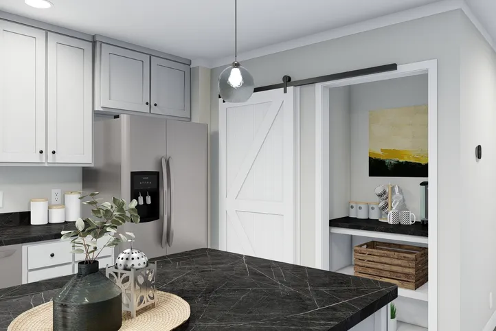 The THE BREEZE Kitchen. This Manufactured Mobile Home features 3 bedrooms and 2 baths.