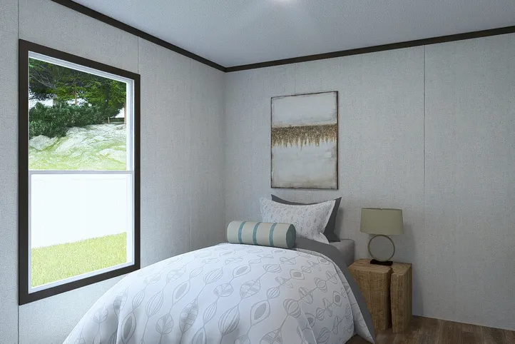 The BALANCE Guest Bedroom. This Manufactured Mobile Home features 3 bedrooms and 2 baths.