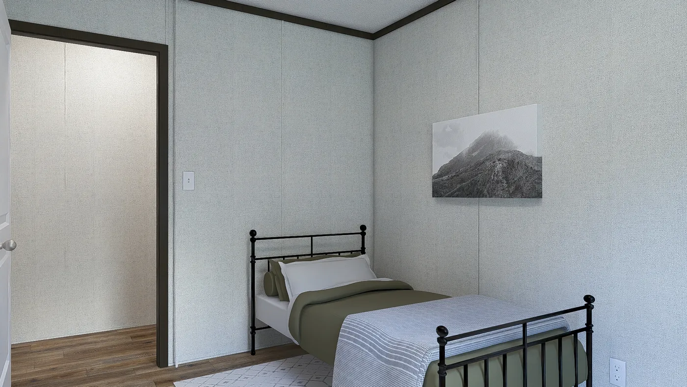 The DYNAMIC Guest Bedroom. This Manufactured Mobile Home features 3 bedrooms and 2 baths.