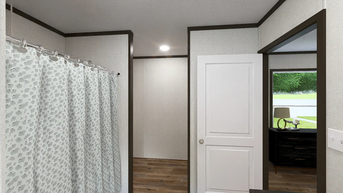 The BALANCE Primary Bathroom. This Manufactured Mobile Home features 3 bedrooms and 2 baths.