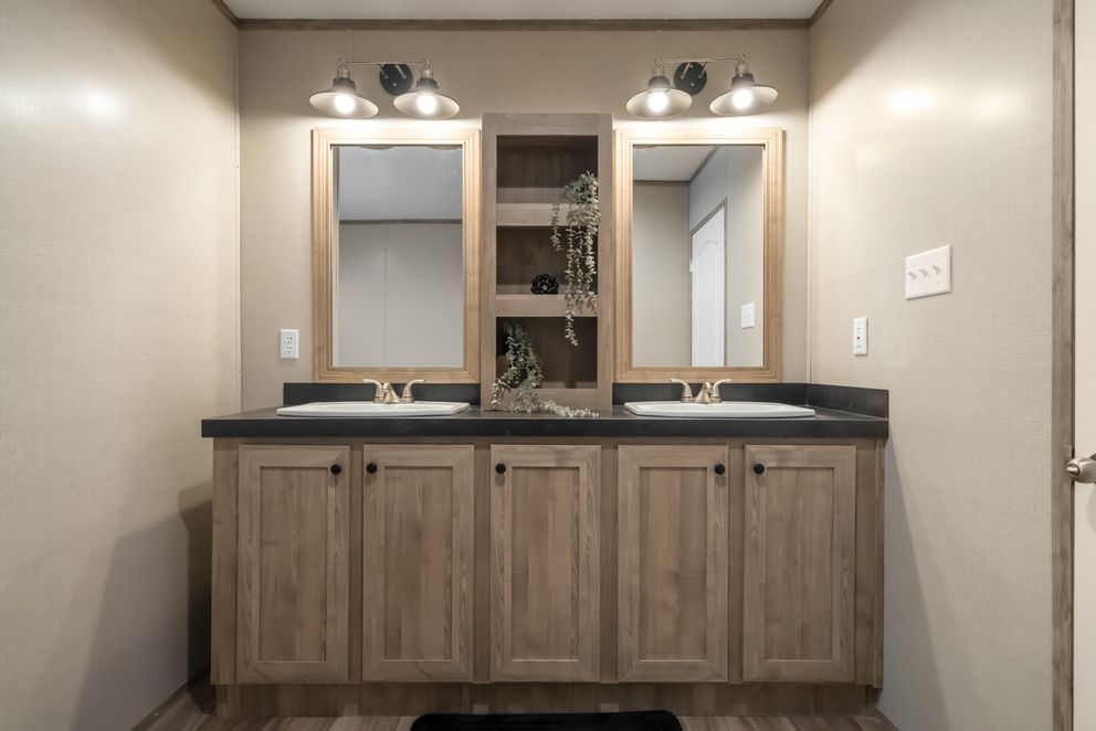 The TRADITION 72 Primary Bathroom. This Manufactured Mobile Home features 3 bedrooms and 2 baths.