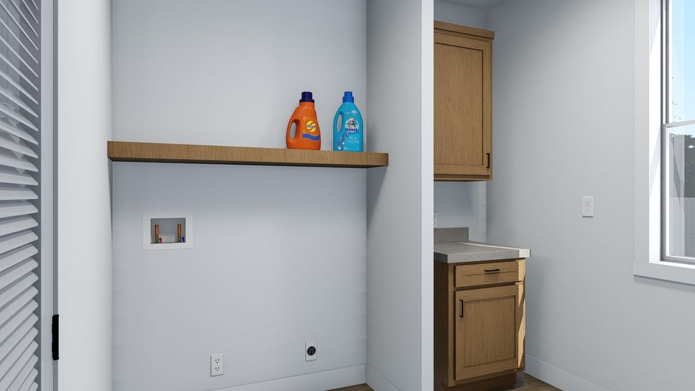 The ACADIA Utility Room. This Manufactured Mobile Home features 3 bedrooms and 2 baths.