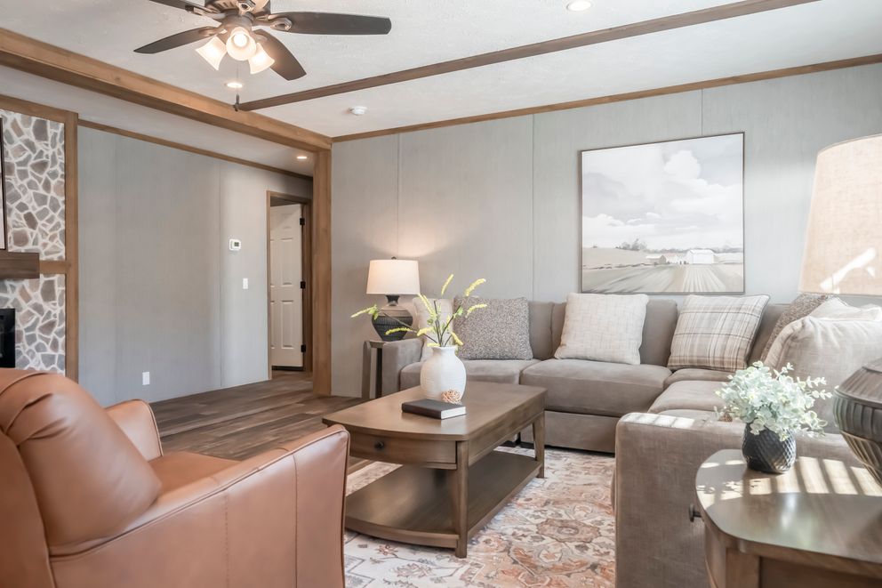 The BLACK DIAMOND Living Room. This Manufactured Mobile Home features 3 bedrooms and 2 baths.