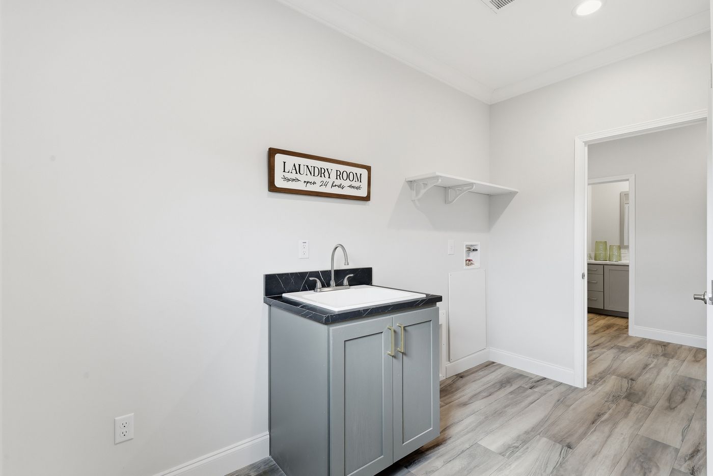 The THE SUMMIT Utility Room. This Manufactured Mobile Home features 3 bedrooms and 2 baths.