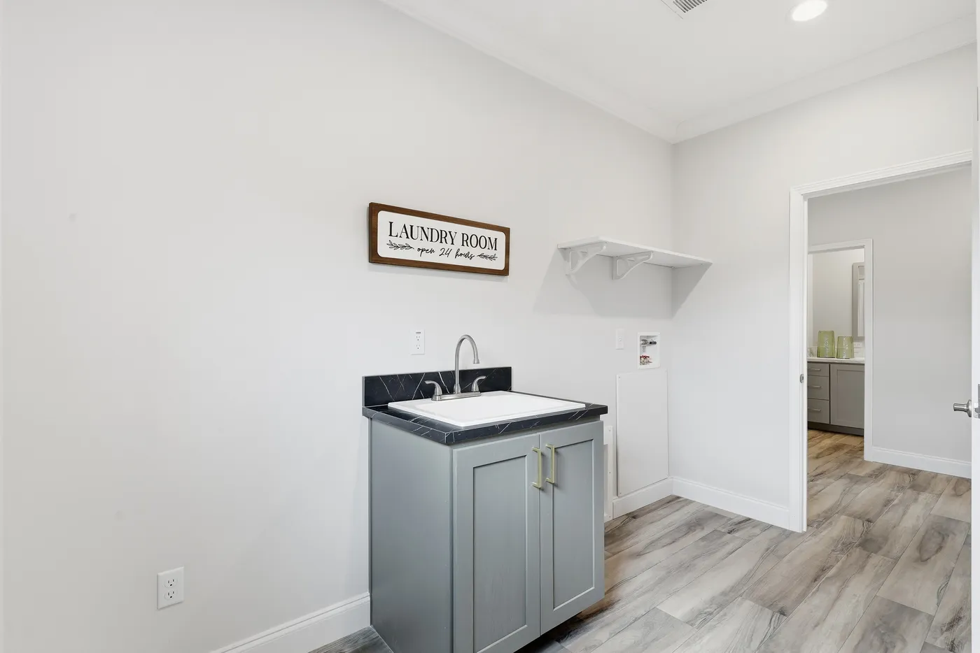 The THE SUMMIT Utility Room. This Manufactured Mobile Home features 3 bedrooms and 2 baths.