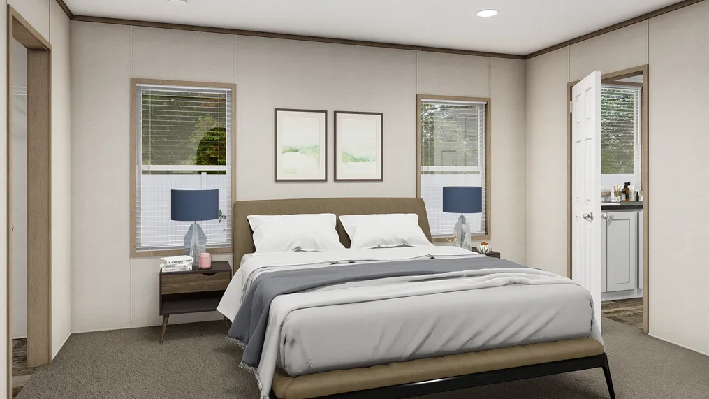 The THE SOUTHERN FARMHOUSE Primary Bedroom. This Manufactured Mobile Home features 3 bedrooms and 2 baths.