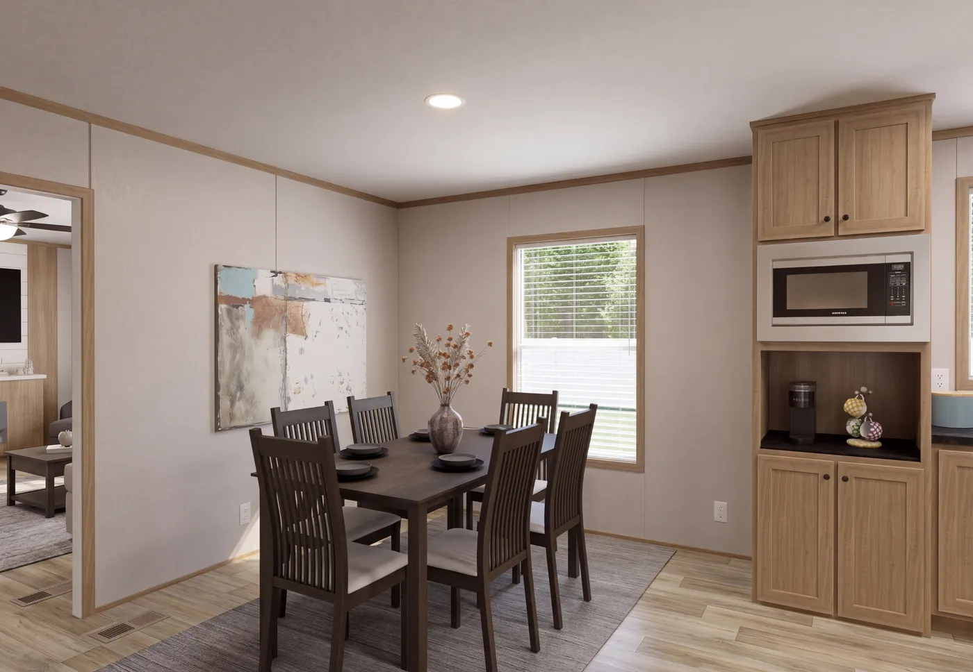 The THE MOUNTAINEER 72 Dining Area. This Manufactured Mobile Home features 3 bedrooms and 2 baths.
