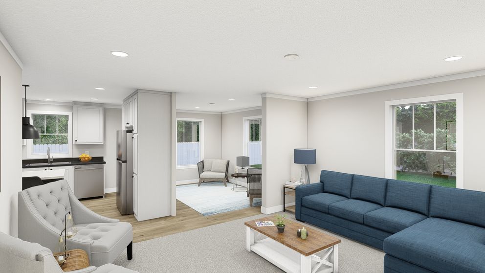 The UNDER PRESSURE Living Room. This Manufactured Mobile Home features 3 bedrooms and 2 baths.