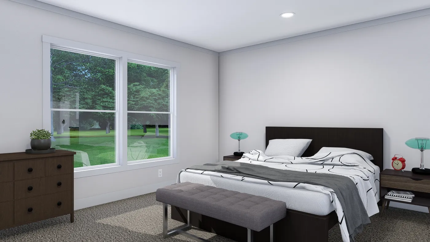 The LOVELY DAY Primary Bedroom. This Manufactured Mobile Home features 4 bedrooms and 2 baths.
