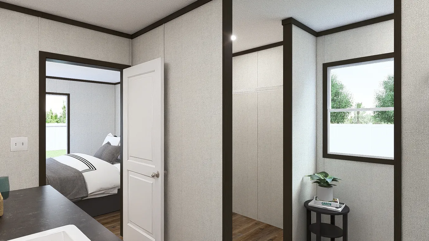 The REVEAL Primary Bathroom. This Manufactured Mobile Home features 3 bedrooms and 2 baths.