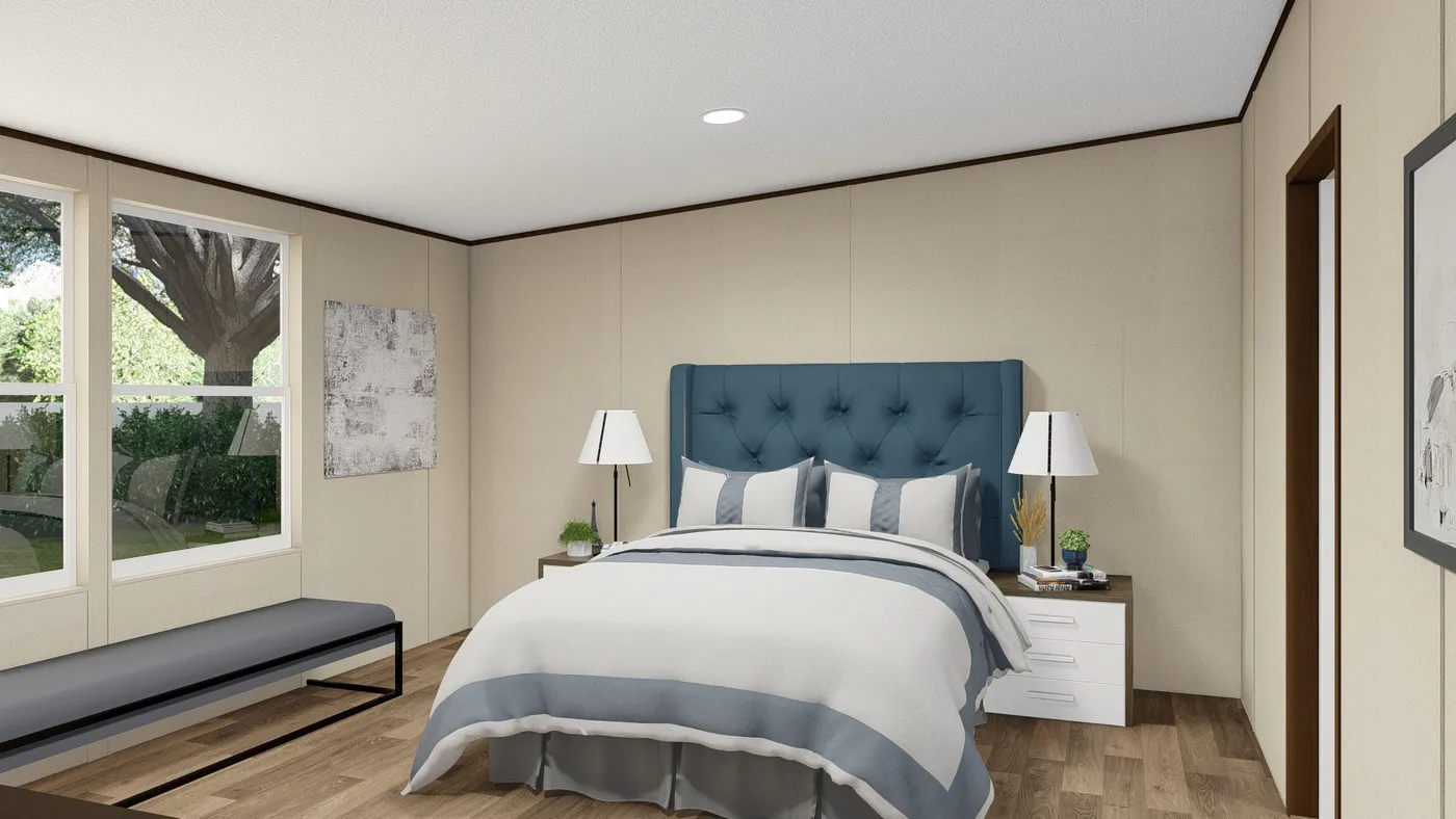 The MARVEL Primary Bedroom. This Manufactured Mobile Home features 4 bedrooms and 2 baths.