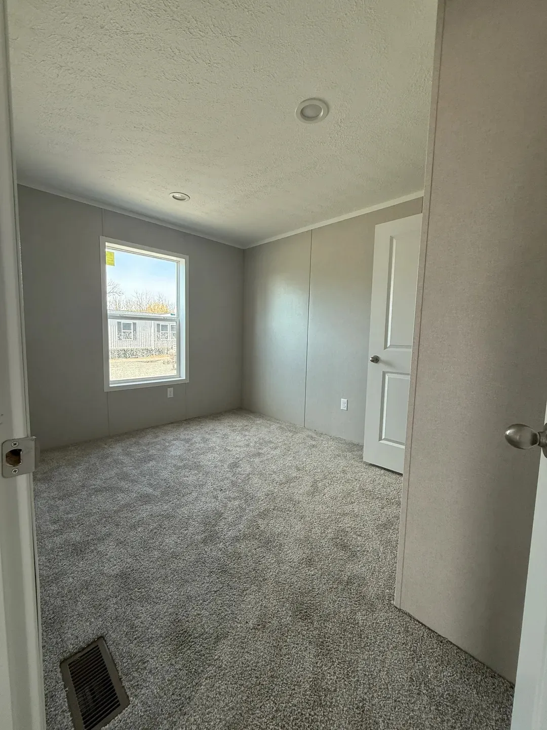 The ONYX Guest Bedroom. This Manufactured Mobile Home features 1 bedroom and 1 bath.