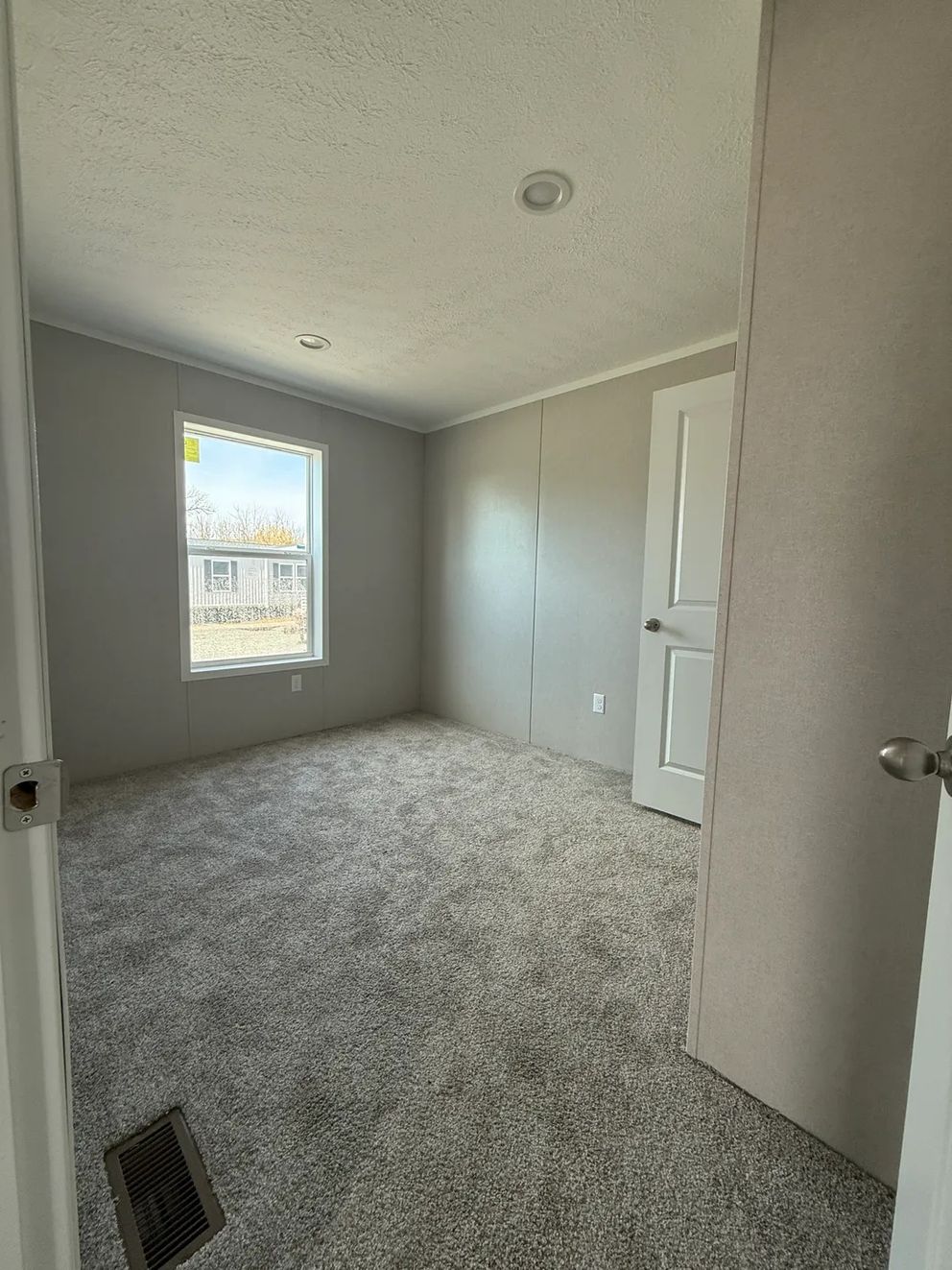 The ONYX Guest Bedroom. This Manufactured Mobile Home features 1 bedroom and 1 bath.