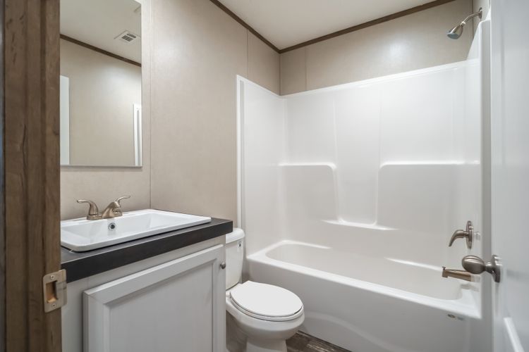 The RIVERHAVEN Guest Bathroom. This Manufactured Mobile Home features 3 bedrooms and 2 baths.