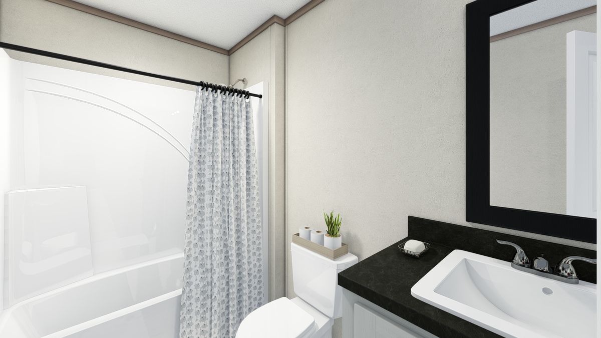 The 4828-5783 THE PULSE Guest Bathroom. This Manufactured Mobile Home features 3 bedrooms and 2 baths.