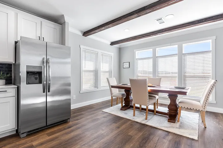 The THE VAIL Dining Room. This Manufactured Mobile Home features 3 bedrooms and 2 baths.