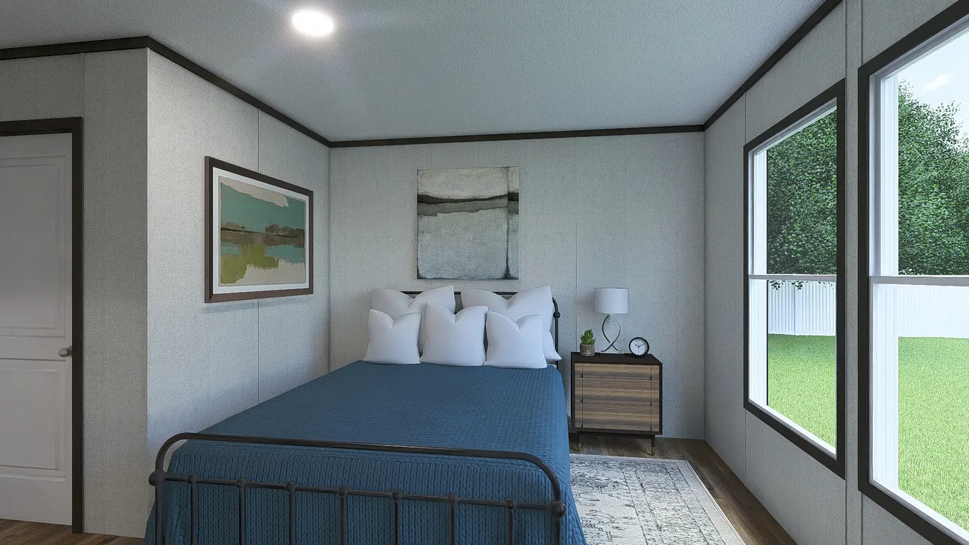 The EMPOWER Guest Bedroom. This Manufactured Mobile Home features 4 bedrooms and 2 baths.