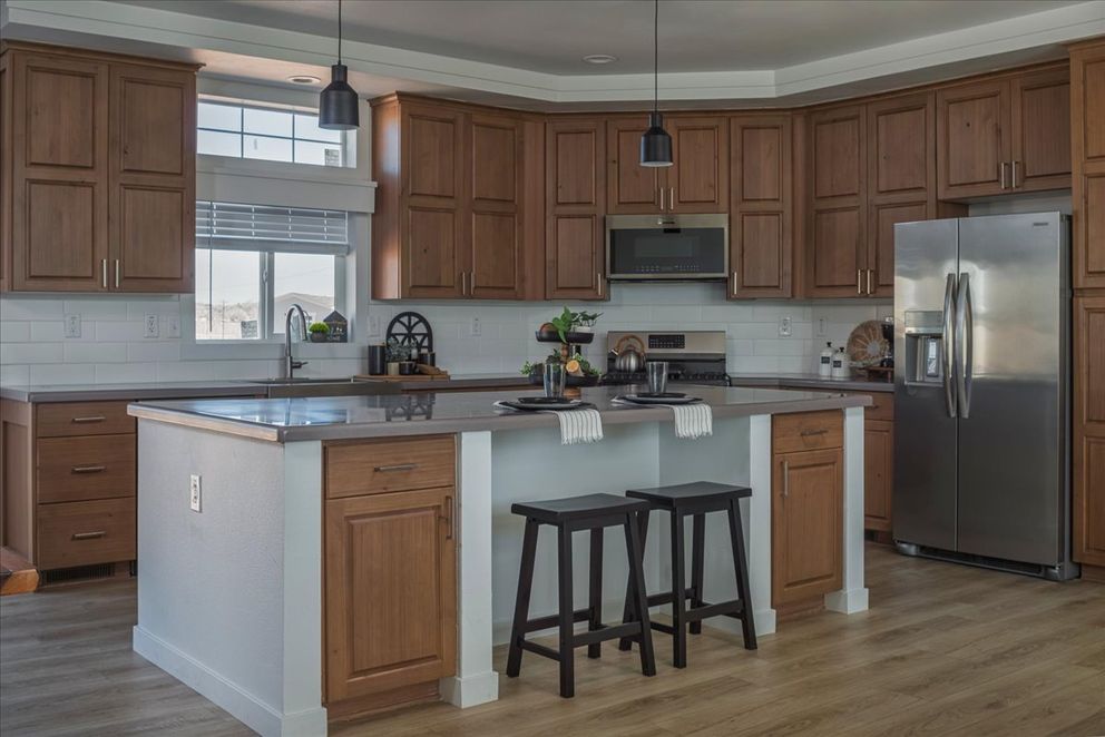 The TU3076A MEGA TUNDRA Kitchen. This Manufactured Mobile Home features 4 bedrooms and 2 baths.