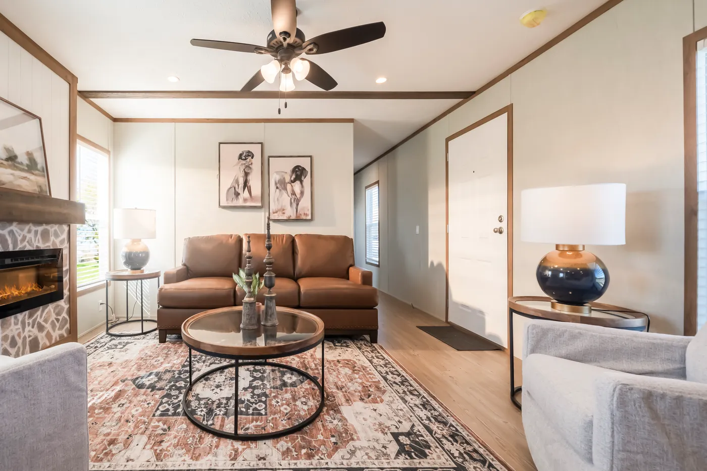 The SEAS THE DAY Living Room. This Manufactured Mobile Home features 3 bedrooms and 2 baths.