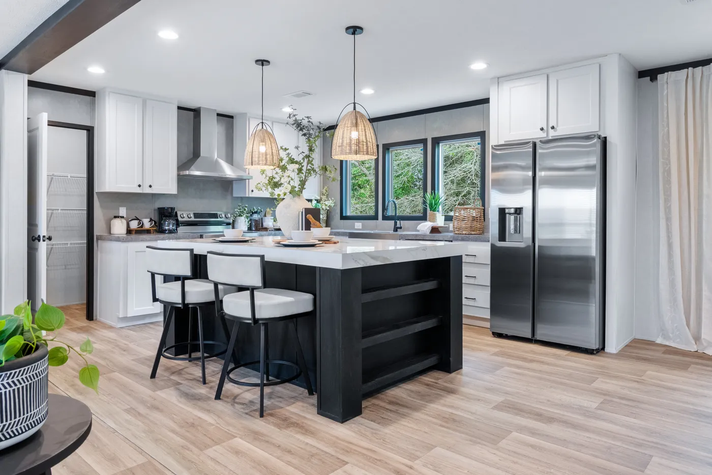 The ABSOLUTE VALUE Kitchen. This Manufactured Mobile Home features 4 bedrooms and 2 baths.