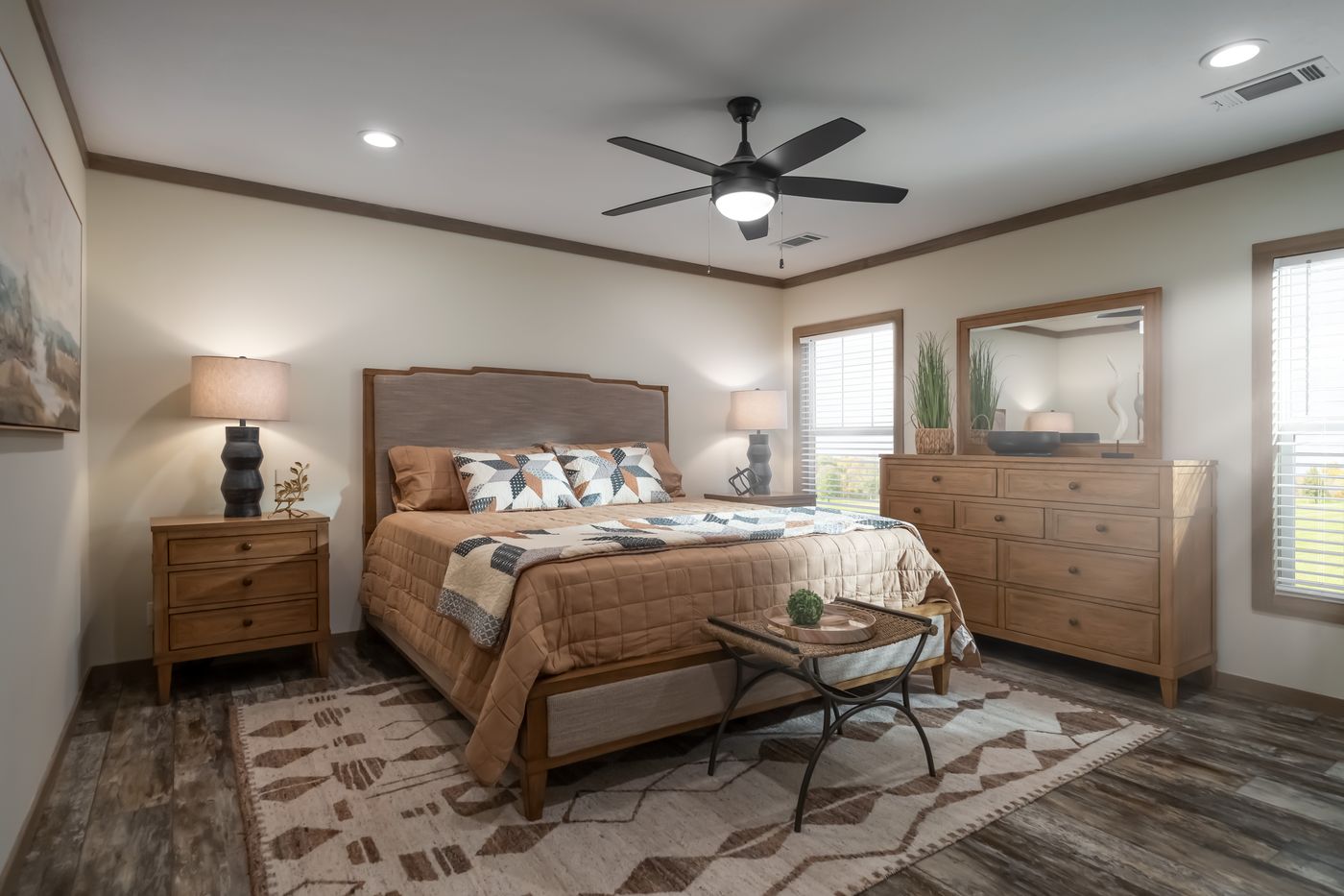 The BOUJEE PREMIER Primary Bedroom. This Manufactured Mobile Home features 4 bedrooms and 2 baths.
