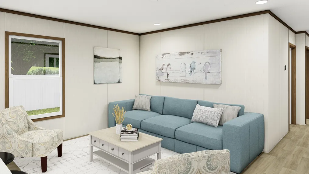 The INTUITION Living Room. This Manufactured Mobile Home features 3 bedrooms and 2 baths.