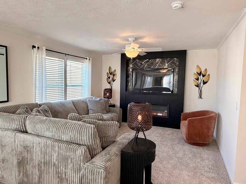 The TOURMALINE 7628-649 Family Room. This Manufactured Mobile Home features 4 bedrooms and 2 baths.