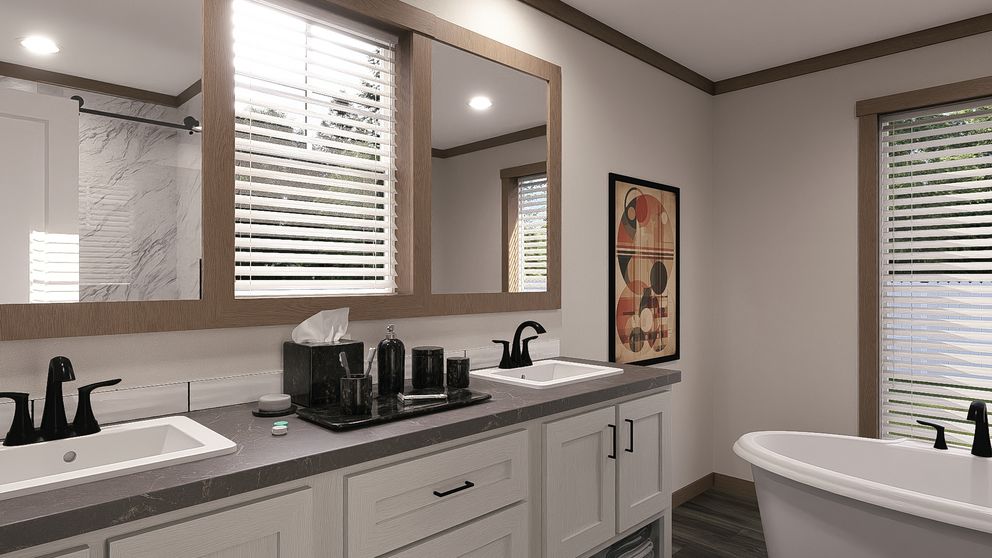 The EVERETT Primary Bathroom. This Manufactured Mobile Home features 4 bedrooms and 3 baths.
