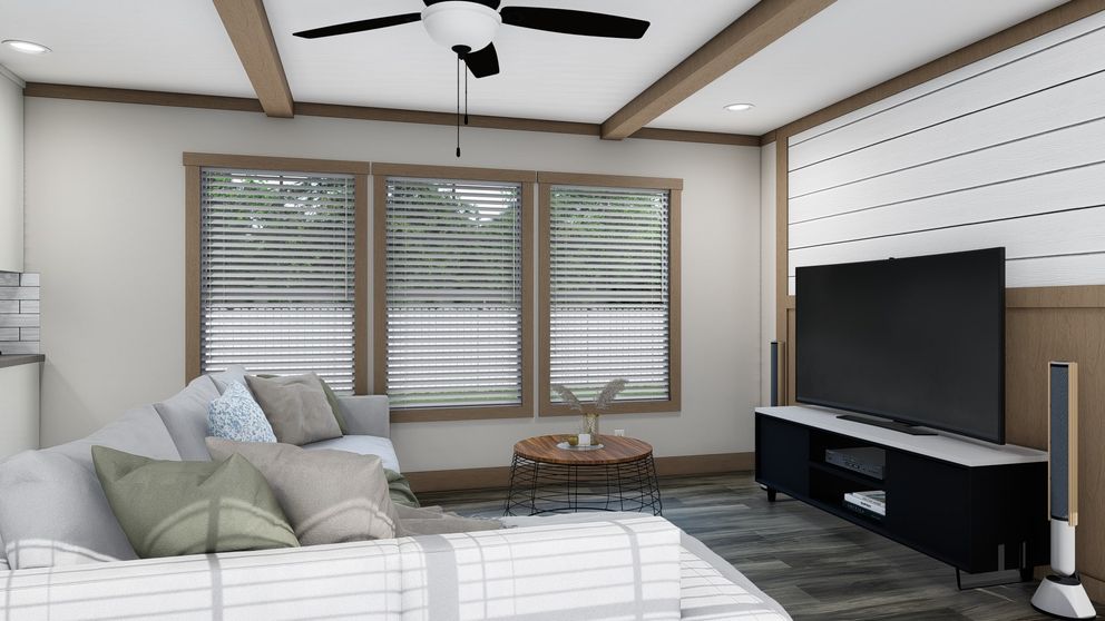 The ANNIE Living Room. This Manufactured Mobile Home features 3 bedrooms and 2 baths.