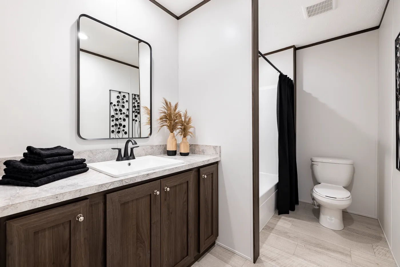 The CRESTWOOD Primary Bathroom. This Manufactured Mobile Home features 3 bedrooms and 2 baths.