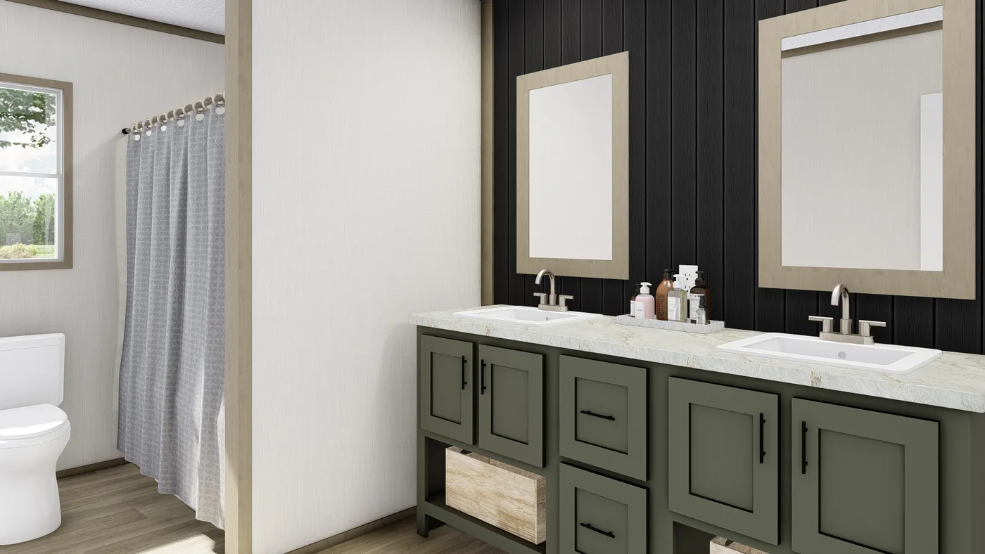 The COOK Primary Bathroom. This Manufactured Mobile Home features 3 bedrooms and 2 baths.