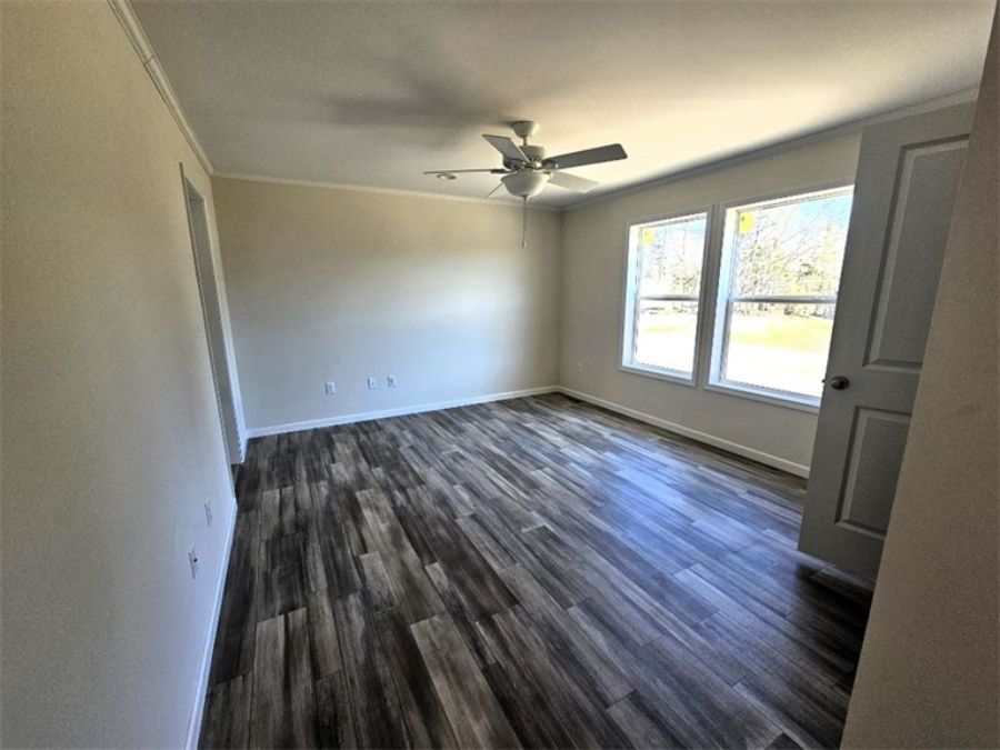 The SPINEL 64 Guest Bedroom. This Manufactured Mobile Home features 3 bedrooms and 2 baths.